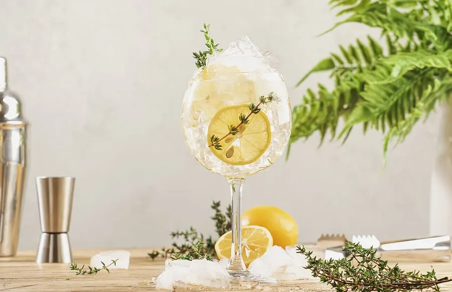 Mix Hennessy and Tonic Water